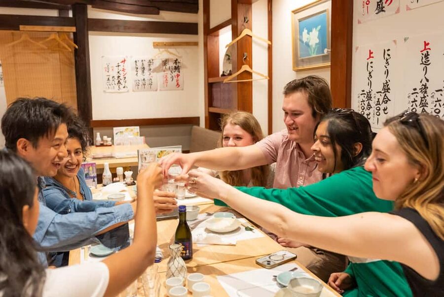 Eat Our Favorites! Osaka’s Backstreet Dining - Sushi at the counter, with sake