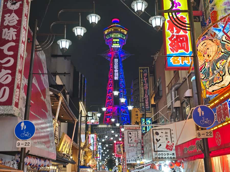 Hungry Osaka Street Food Tour: 15 Dishes & 3 Drinks - Guides, group conversation, and the neighborhood