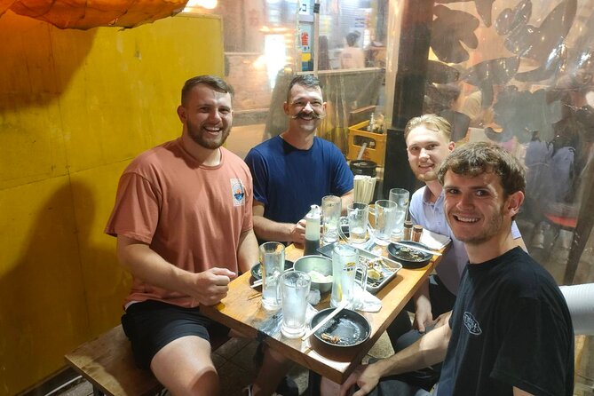 Hungry Osaka Street Food Tour:15 Tastings & 3 Drinks with a Local - Shinsekai’s food streets make the evening