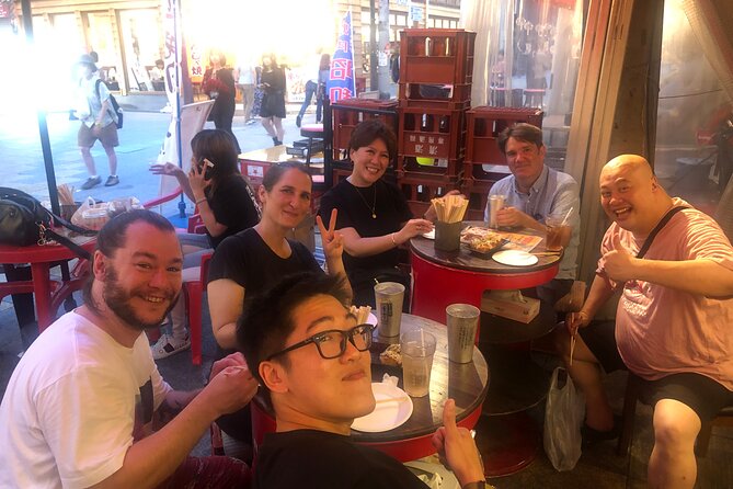 Hungry Osaka Street Food Tour:15 Tastings & 3 Drinks with a Local - Tsutenkaku and the story of the streets