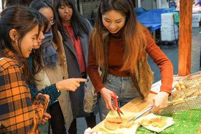 Kuromon Market Food Walking Tour in Osaka (6 stops, 6 tastes) - Namba and Dotonbori add city context