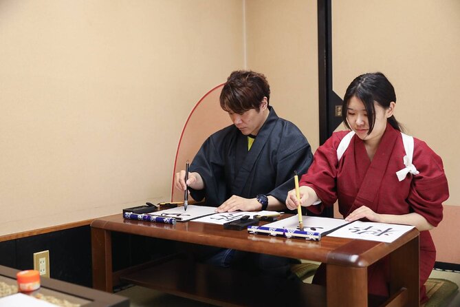 Learning Zen of Japanese Calligraphy in kimono near Osaka Castle - A wooden name tag, then your final piece