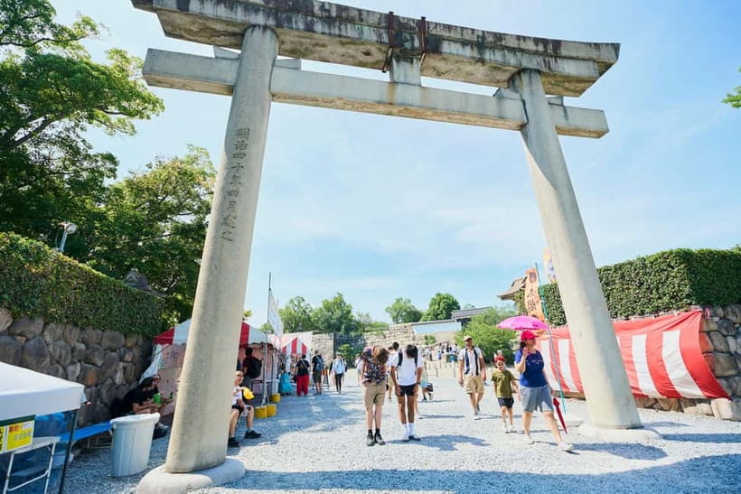 Osaka: Castle History Walking Tour / Castle Tower Admission - Inside the tower: weapons, gold, and city views