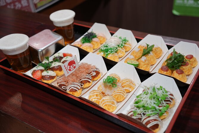 Osaka Delights: Traditional Japanese Food Tour - Dotonbori and the Glico sign after dark