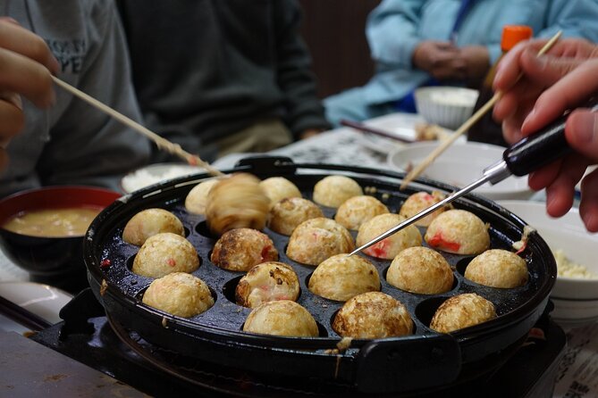 Osaka Delights: Traditional Japanese Food Tour - Okonomiyaki and kushikatsu bring the hearty flavors