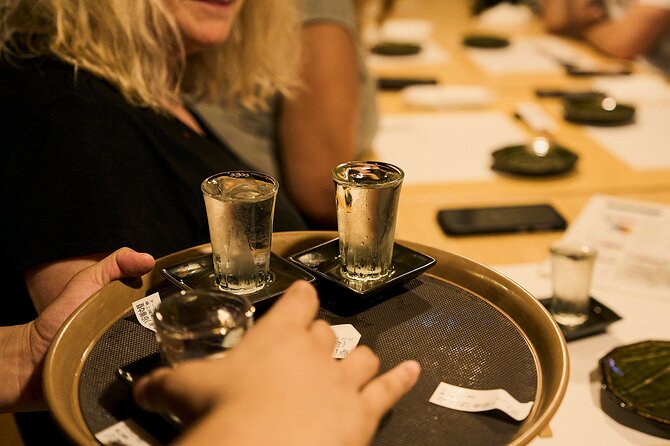 Osaka: Guided Food Tour with 12 Dishes at 4 Local Eateries - Restaurants, sake bars, and street food