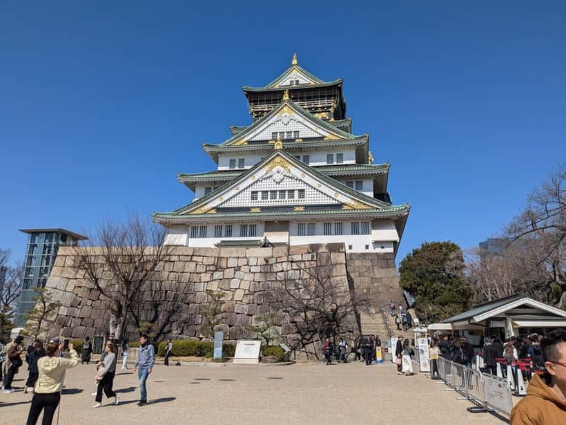 Osaka: Osaka Castle Guided Tour with Local Guide - Stone walls, defenses, and the castle grounds
